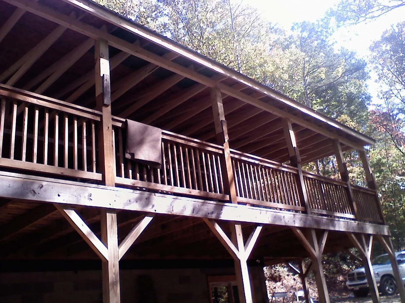 Timber framing under a new elevated porch and deck — Roof Leak Repair in Petrolia by Roofing Brothers